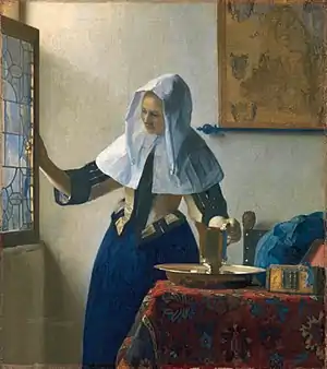 Una palangana de Jan Vermeer, en Mujer con una jarra de agua (1662).