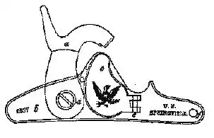 "Ilustración de la llave de un fusil Modelo 1855. La pequeña placa con el águila es la cubierta del cebador de cinta Maynard".