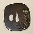 Tsuba de cobre con la imagen de Shōki, obra de Masayuki Tsuba (1695-1769).