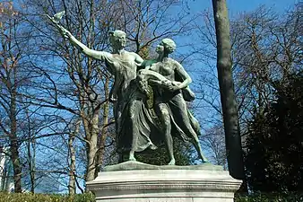 «&nbsp;El genio belga guiando al Congo&nbsp;»(Monument General Thys, Cincuentenario, Bruselas).