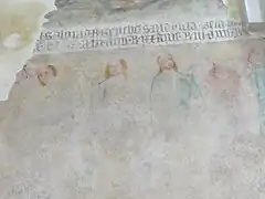 Fragmento de una banda de inscripción del siglo&nbsp;XIV que separa la franja de pinturas del lado norte del monasterio. A continuación se muestra una serie de reyes.