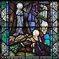 Aparición de la Virgen en Lourdes, vidriera de la iglesia de Santa María y San Miguel, North Aisle, siglo XX.