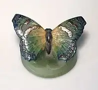 Pisapapeles mariposa.