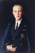 Alfonso de Borbón con la insignia. (Laszlo, 1927)