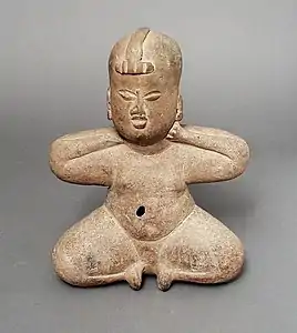 Niño sentado. Cerámica roja tardía, ss. V-II a.&nbsp;C. Preclásico tardío.