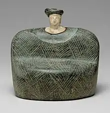 Mujer sentada, terracota pintada de la civilización del Oxus, hacia el 2000&nbsp;a.&nbsp;C.