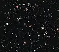 vista XDF (2012) - cada partícula de luz es una galaxia - algunas de ellas son de hasta 13&nbsp;200 millones años de antigüedad - el universo se estima contiene 200&nbsp;000 millones de galaxias.