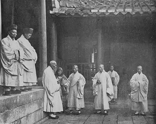 Buddhist Monks by John Thomson.jpg