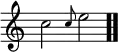 \relative c'' { \override Score.TimeSignature #'stencil = ##f \time 4/4 c2 \grace c8 e2 \bar ".." }