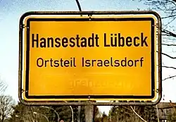 Entry into a built-up area (Lübeck). This sign also demarcates the start of a 50 km/h speed limit