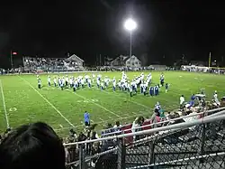 A huge light pointed toward a football field