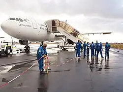 A group boarding a plane