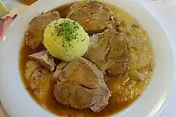 Wellfleisch with sauerkraut and dumpling