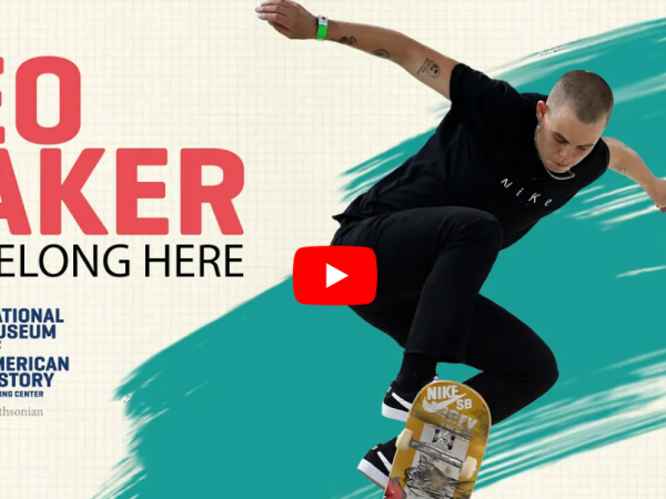 Leo Baker does a jump from a skateboard in the air