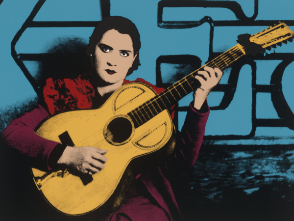 woman playing a guitar