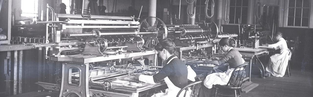 Black and white image of women working in a factory